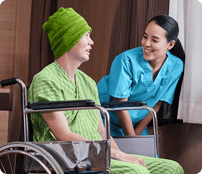 Nurse and patient smiling